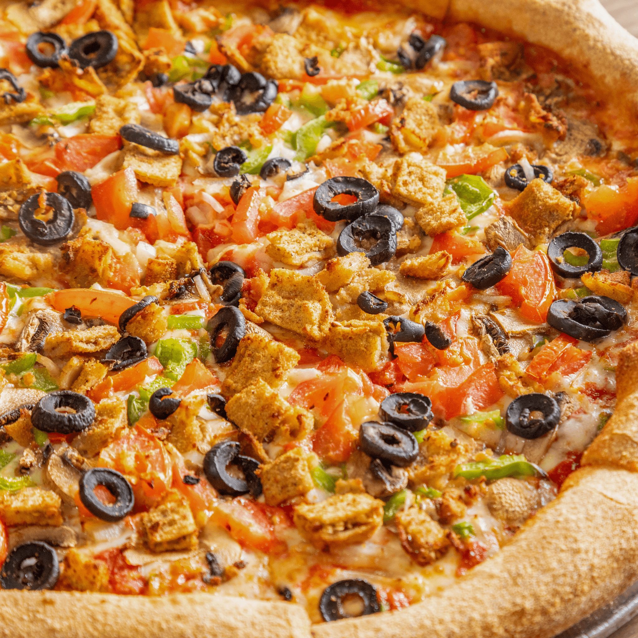 Veggie lovers pizza slice.