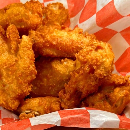 12 Crispy breaded wings, freshly fried.