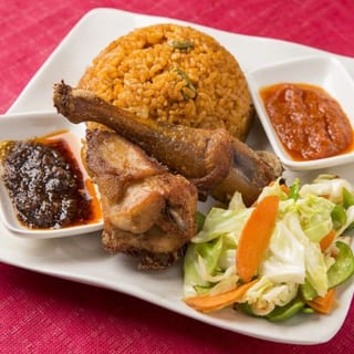 Jollof Rice with Goat, beef, or assorted meats