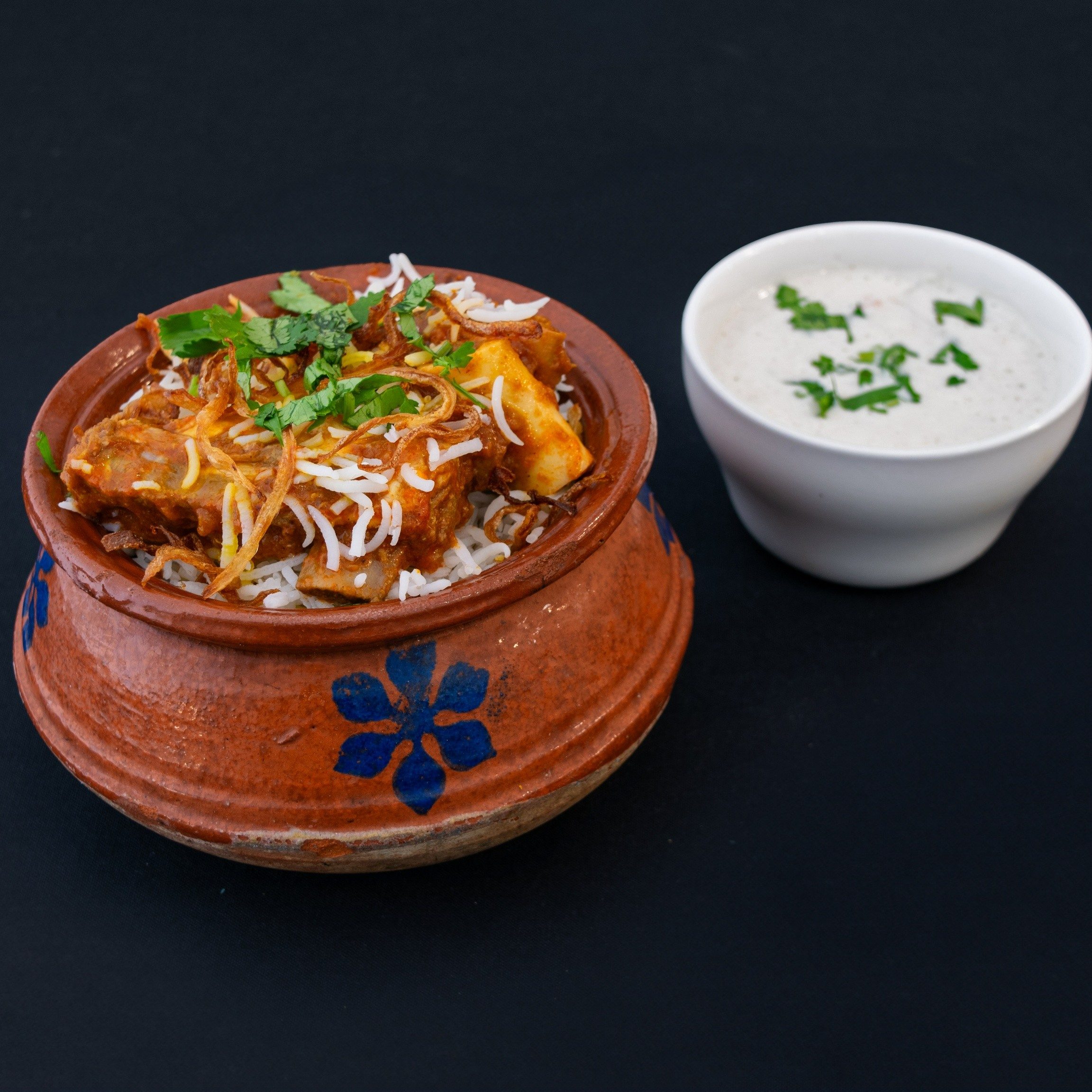 Dum Pukht Goat Biryani.