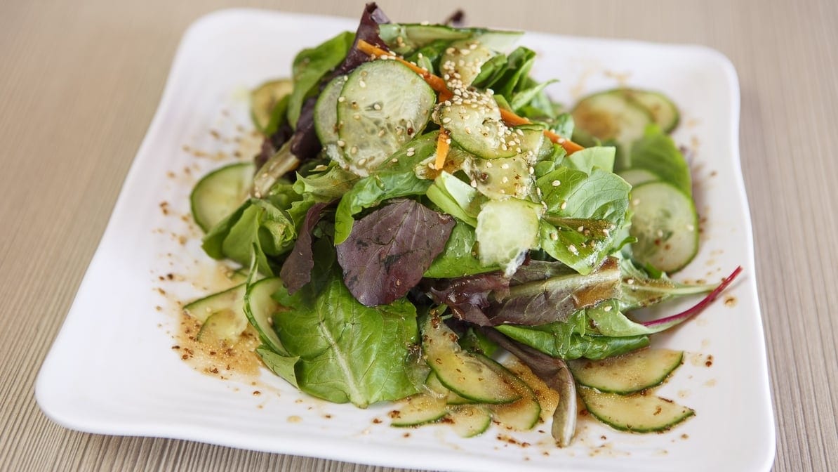 Mixed Green Salad with House Dressing.