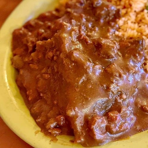Tamale with Red Chile Con Carne.