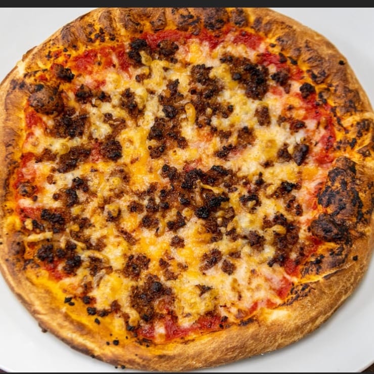 Plant-based sausage pizza.