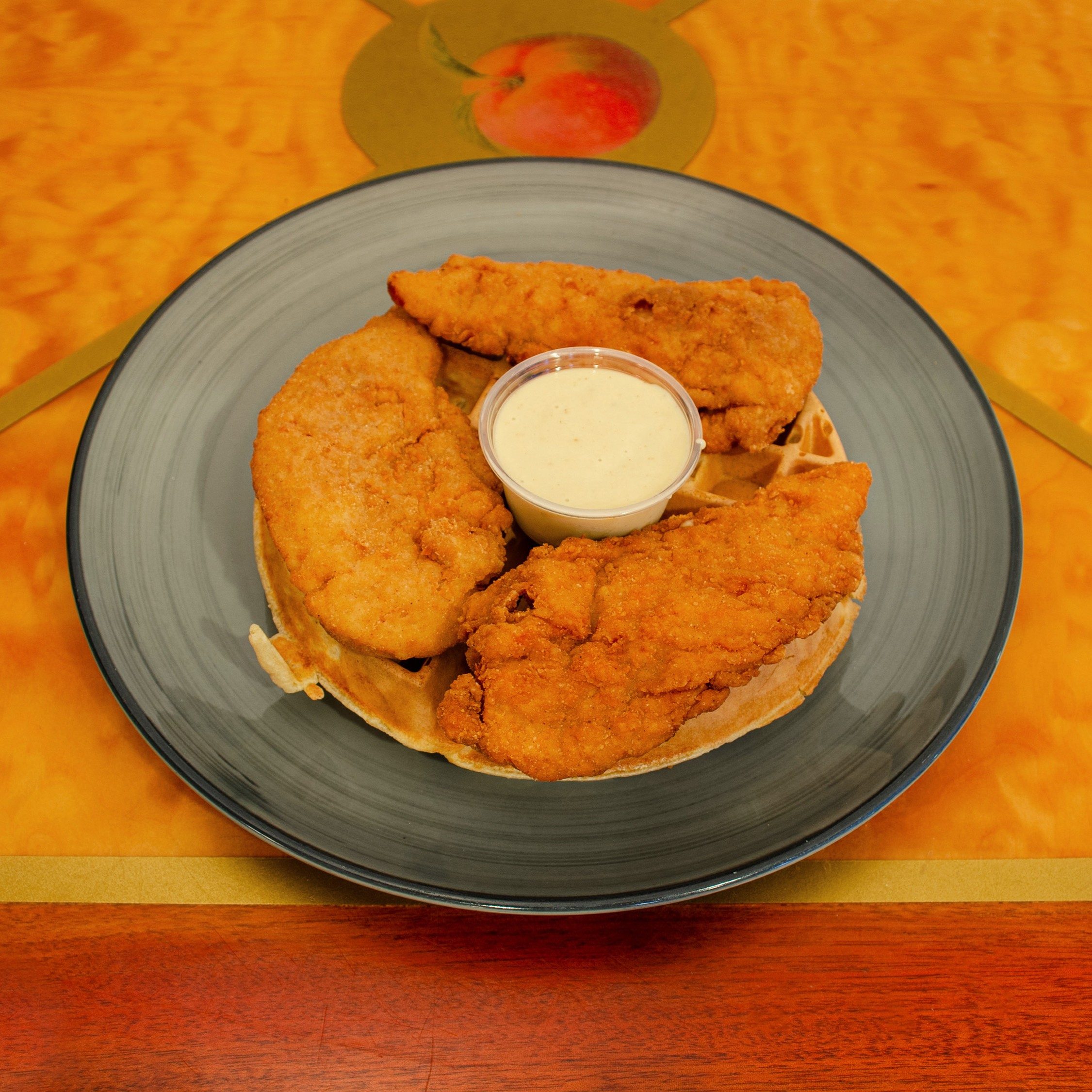 Belgian Waffle with 3 Chicken Fingers.