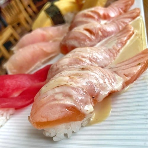 SEARED SALMON SASHIMI.