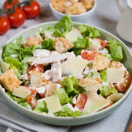 Caesar Salad with Grilled or Breaded Chicken Breast.