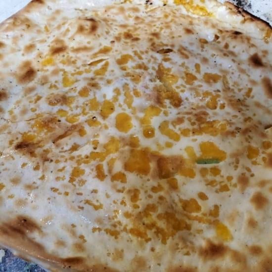Vegan spicy cheese naan.