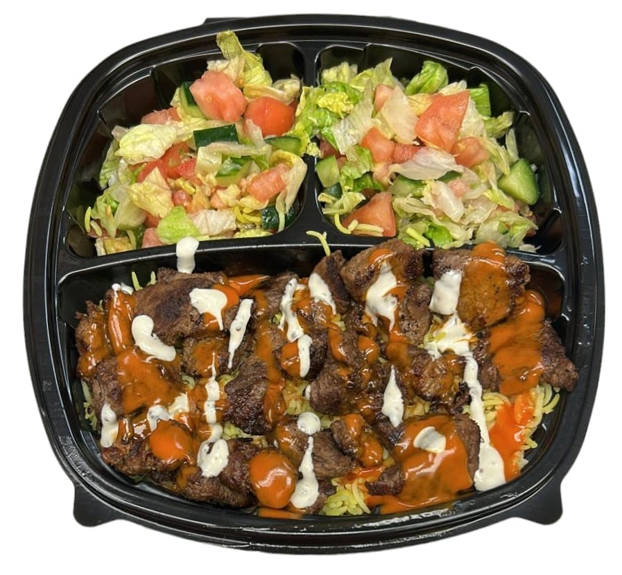 Halal Grilled Lamb on Rice with Salad & Buffalo and Ranch Sauce on the Top.