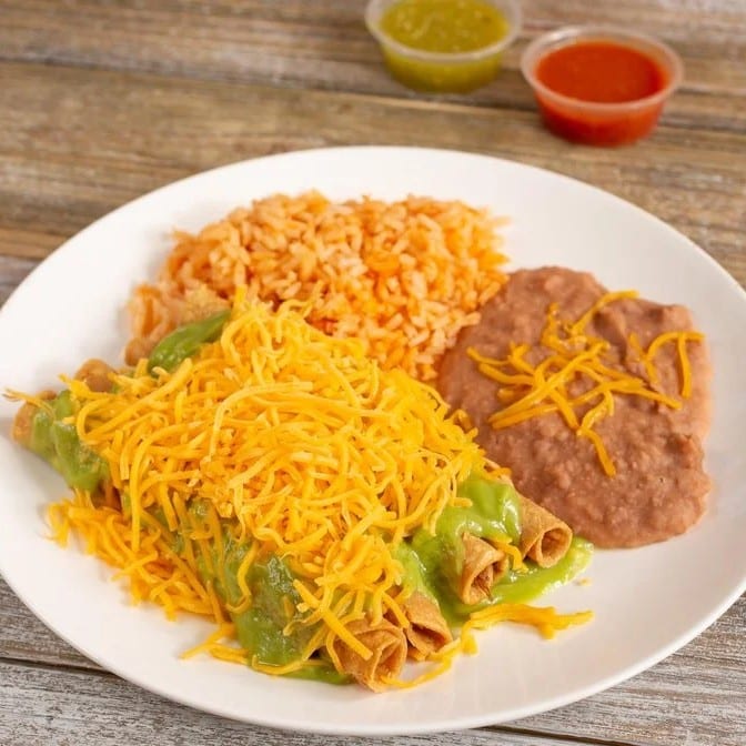 4 Rolled Tacos, Rice, Beans and a drink.