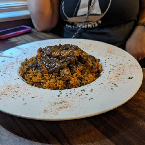 Vegan Jerk Chick N/Mushroom Rice.