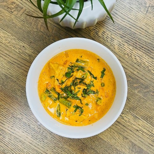 Korma Stache Served with Rice and Classic Naan.