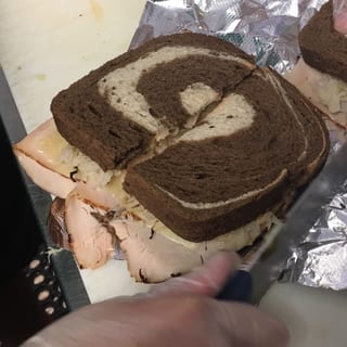 #28  Half Reuben Sub.