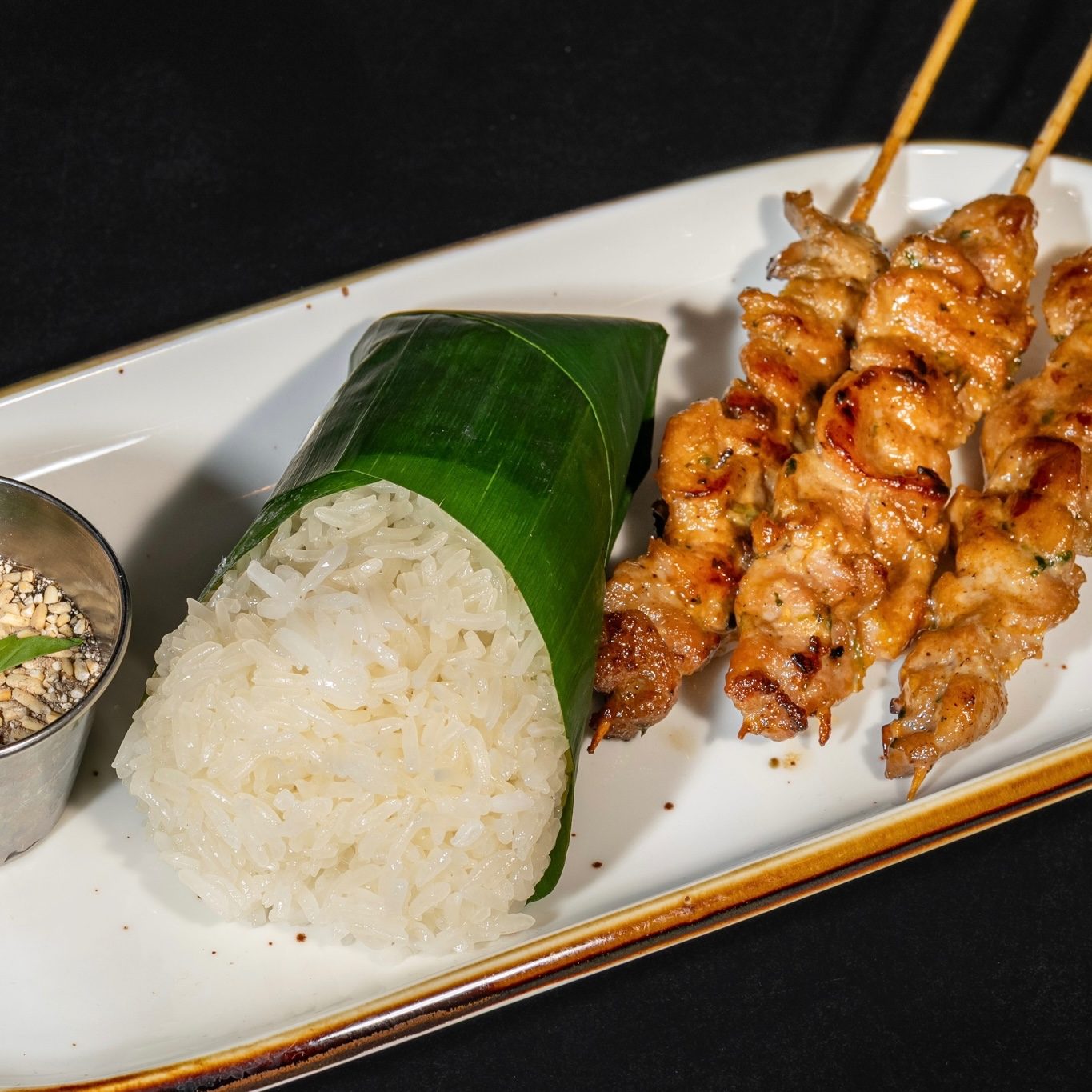 A11. Grilled Pork Moo Ping (3 Skewers).