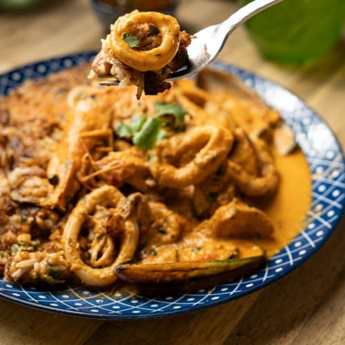 Tacu Tacu con Picante de Mariscos.