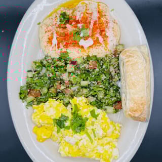 2 Eggs, Humus, tabouli & pita bread.