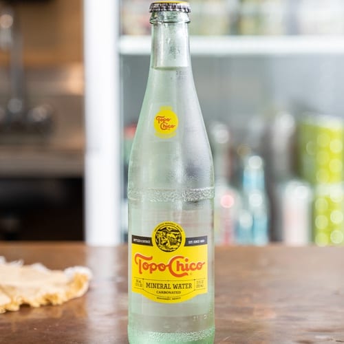 Topo Chico Mineral Water.