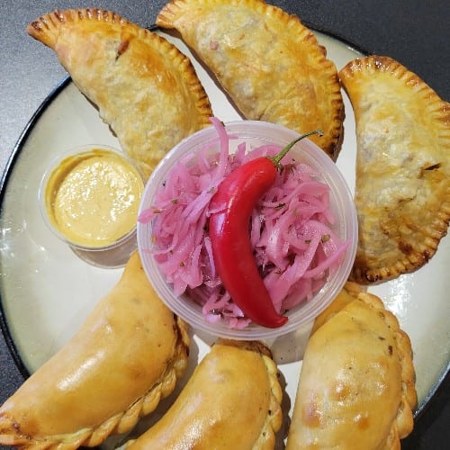 TWO Empanadas: One Beef and One Chicken.