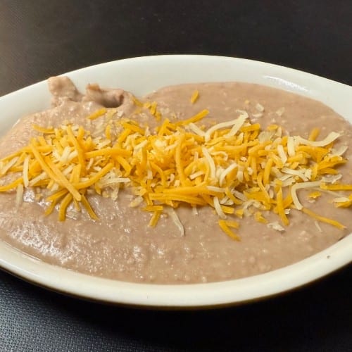 Refried Beans or Black Beans.