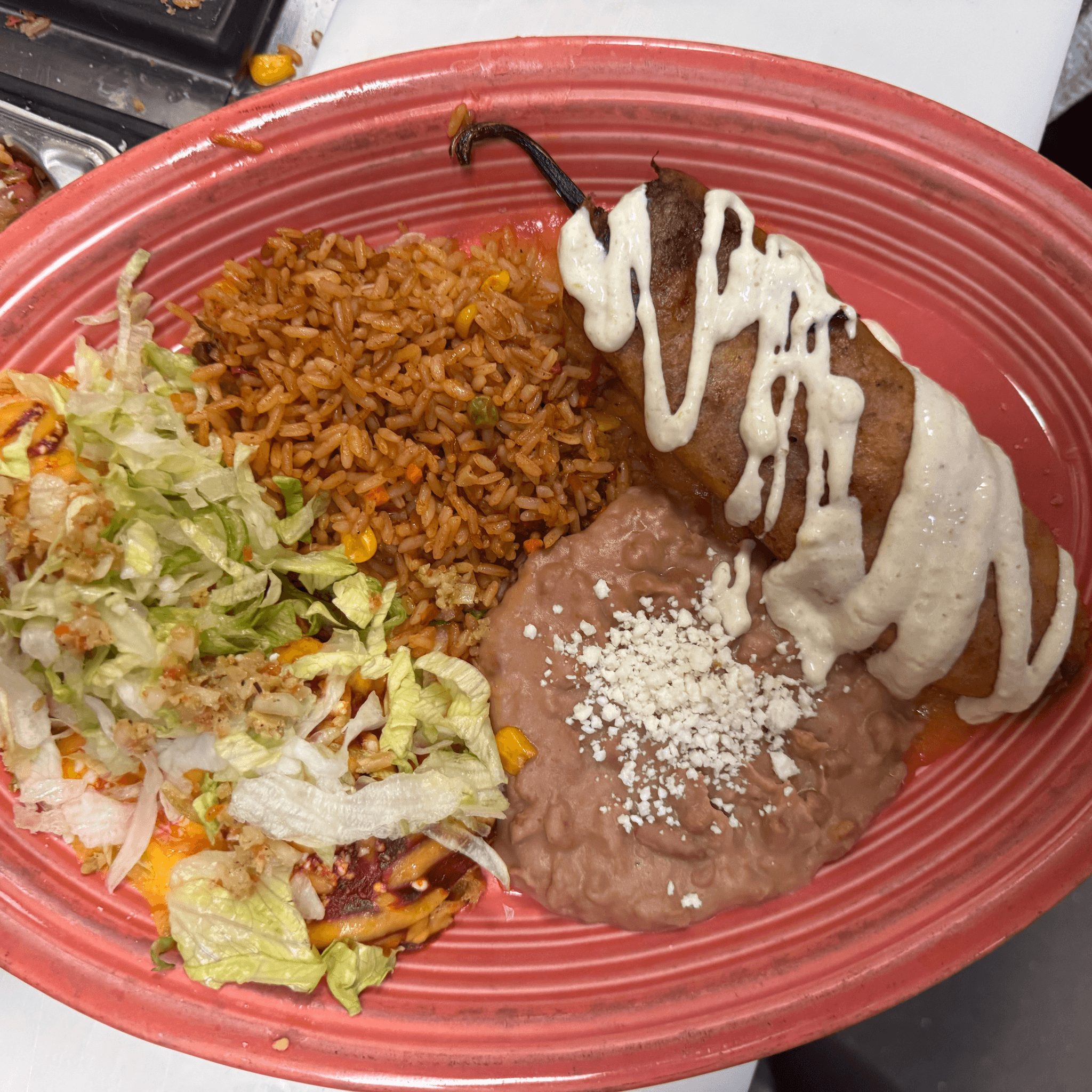 One Chile Relleno, One Enchilada of Your Choice.