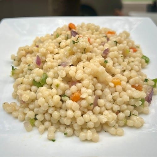 Side Cous cous with veggies.