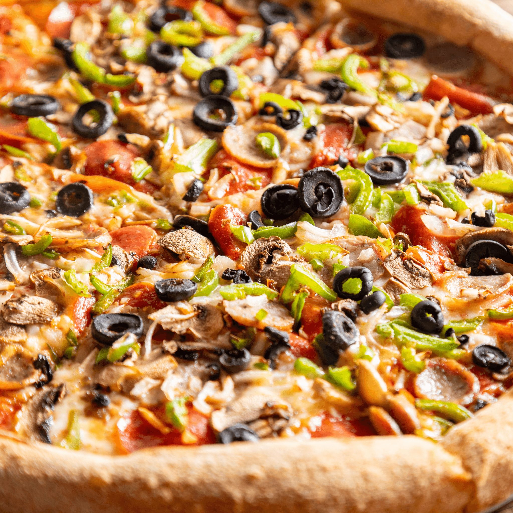 Davie's best deluxe pizza slice.