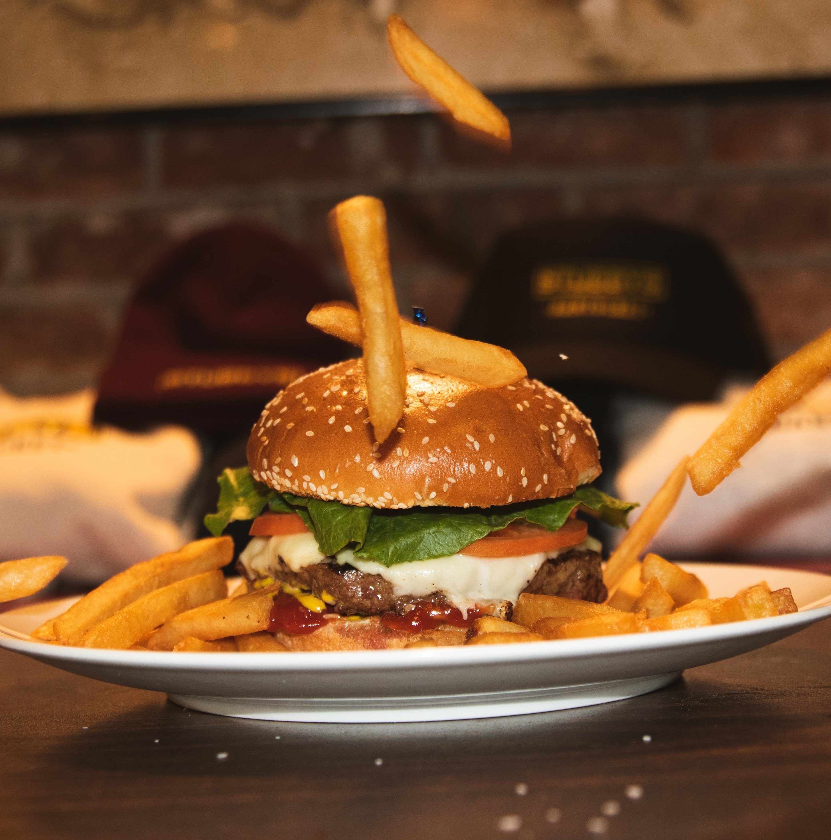 CHEESEBURGER DELUXE WITH FRIES.