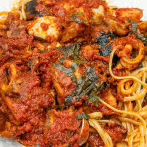 Zuppa Di Pesce Over Linguini.