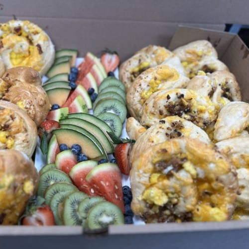 Breakfast Rolls w/Fresh Fruit Platter.