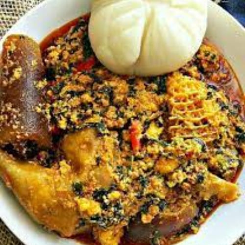 Egusi and Pounded Yam serves w/ goat, beef, or assorted meats..