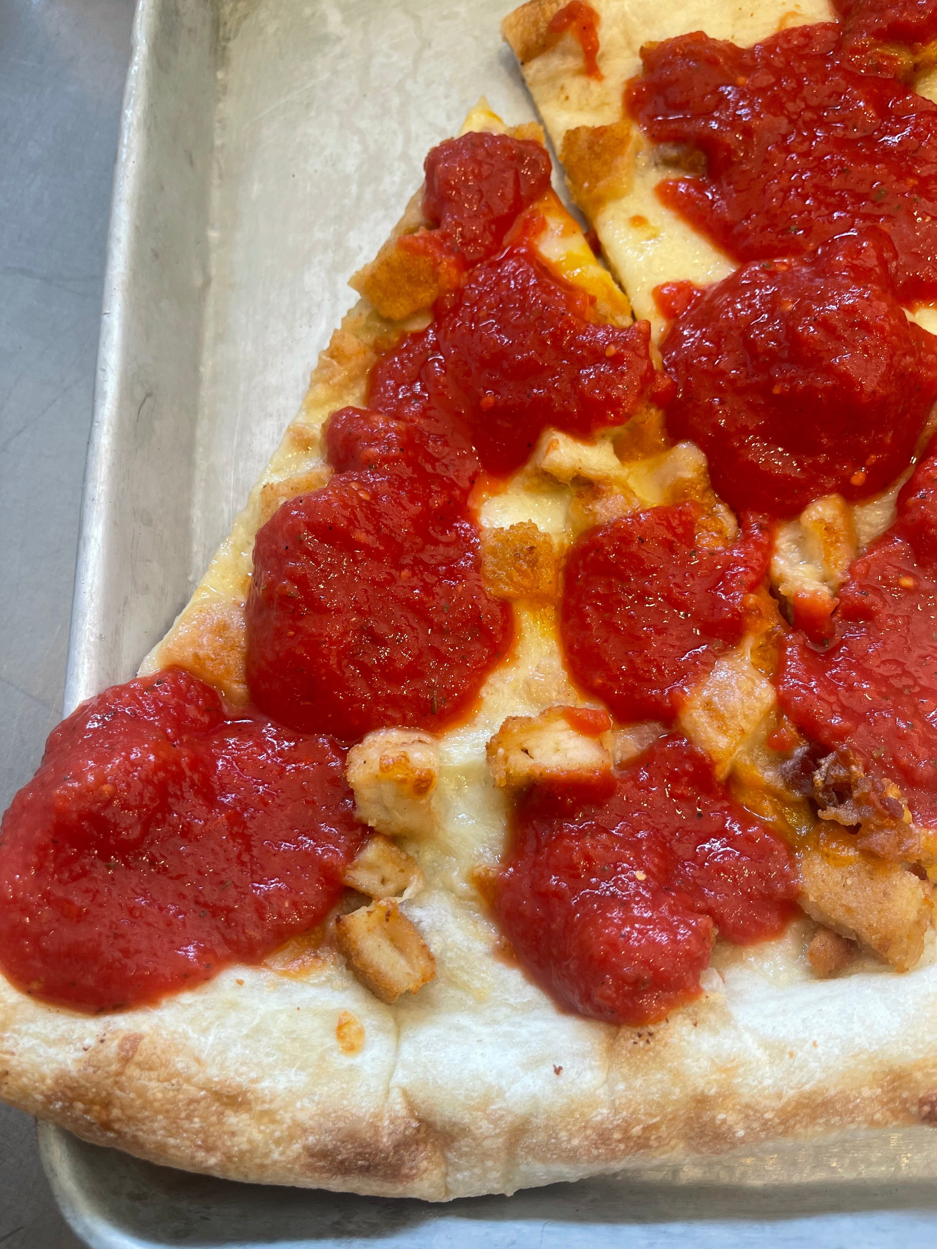 Chicken Parm Pizza Slice.