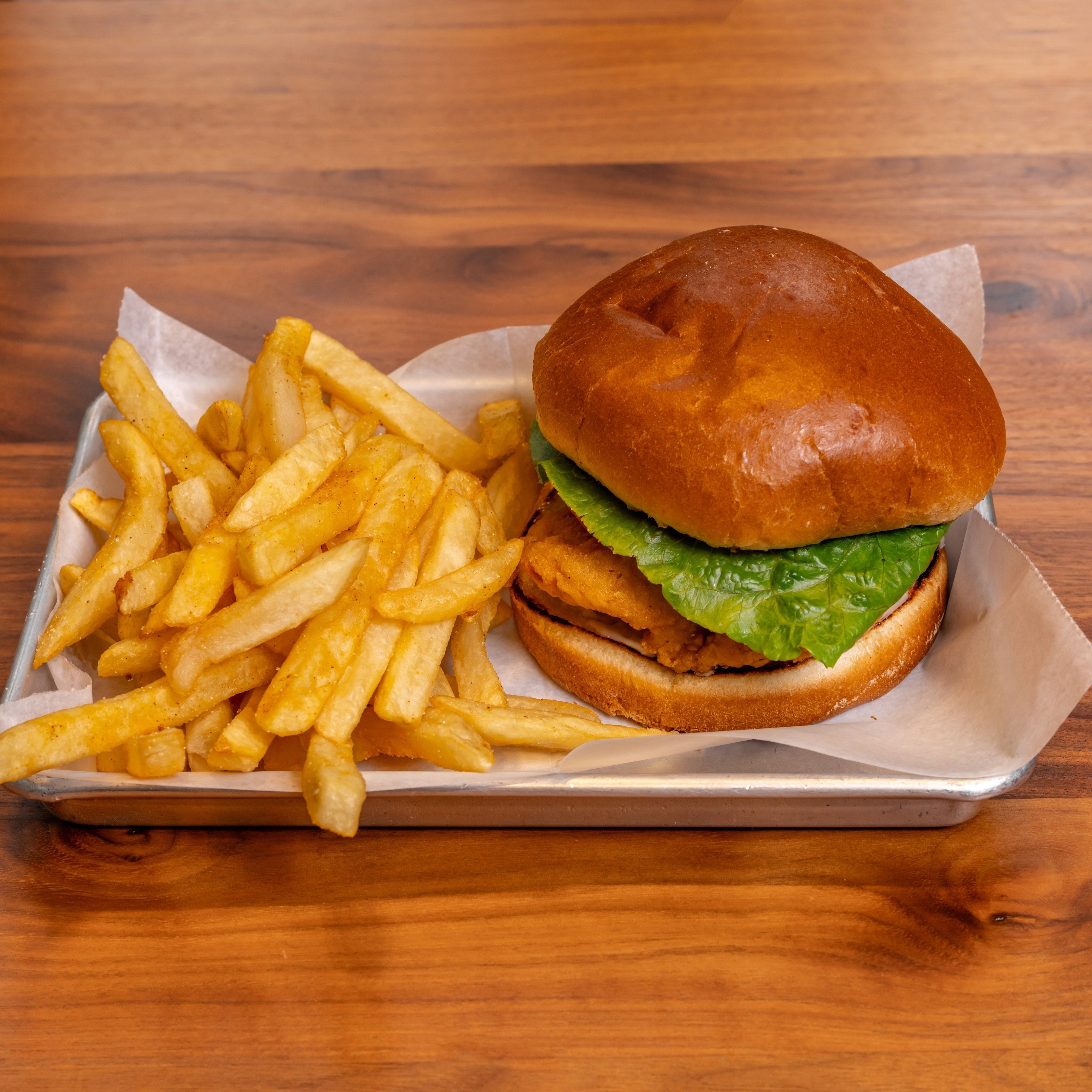 FRIED CHICKEN SANDWICH WITH FRIES.