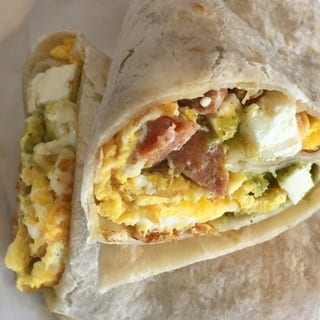 Breakfast Burrito: GrrilledSliced Kosher Hot Dog, 2 Eggs, Salsa Verde, Plant Based Cheese