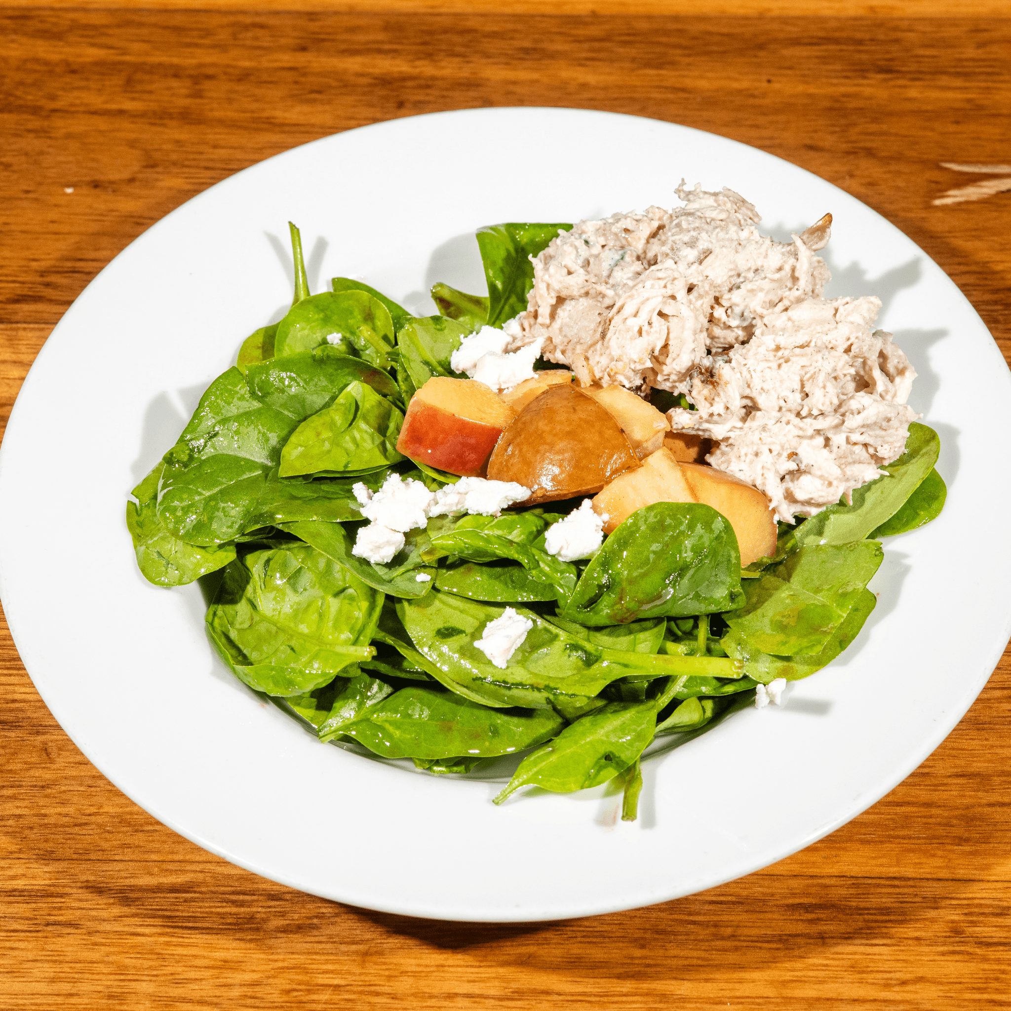 Tossed Organic Greens with Goat Cheese and Poached Pears Salad.