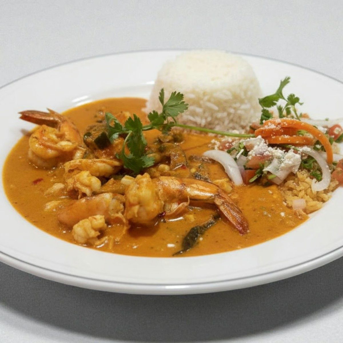 Camarones en Crema De Tequila.