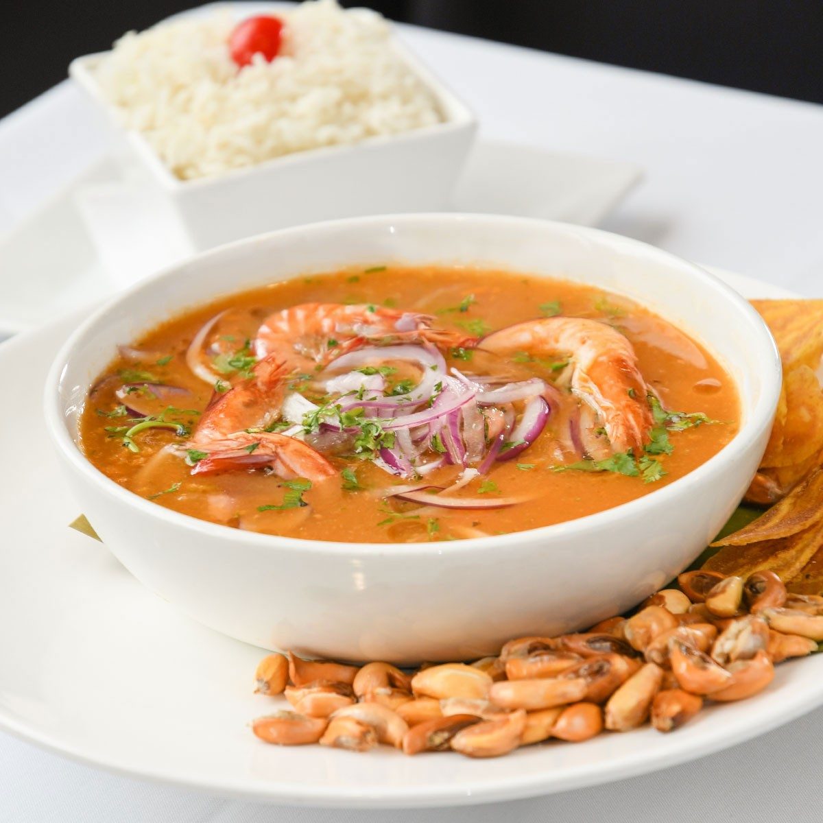 Encebollado Mixto / Tuna Fish and Shrimp Soup.