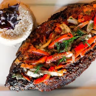 Atteike or White Rice and Tilapia Fish