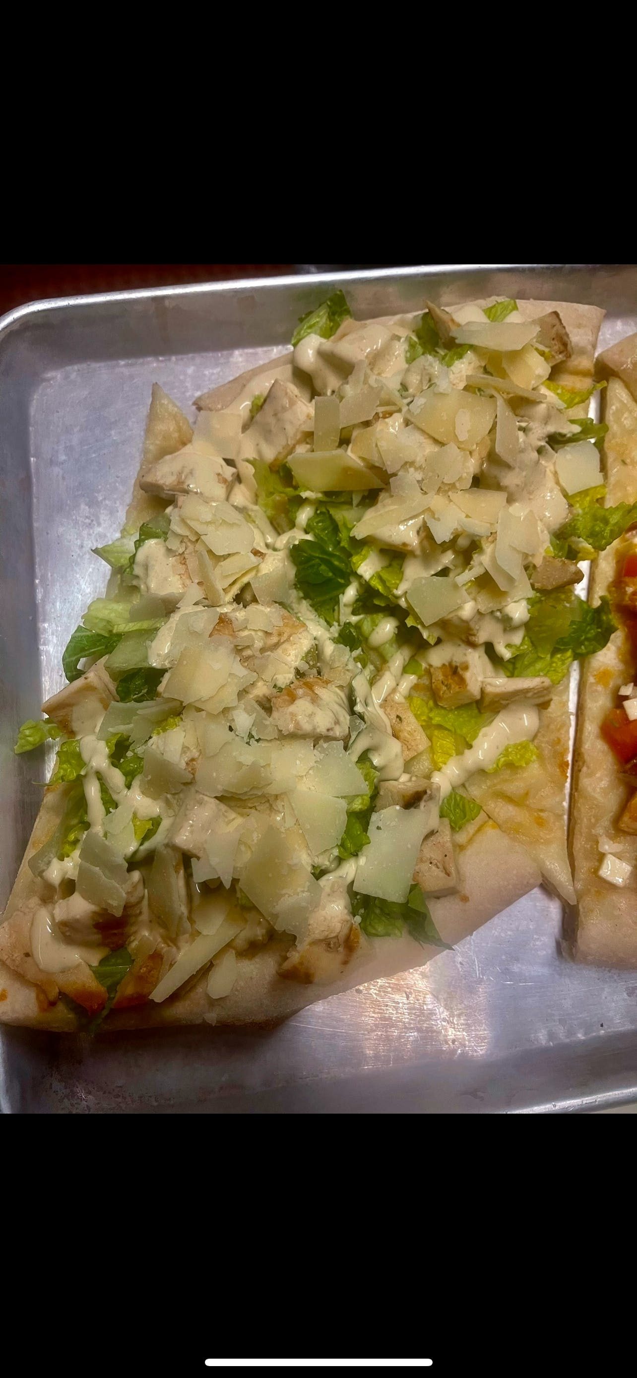 Chicken Caesar Pizza Slice.