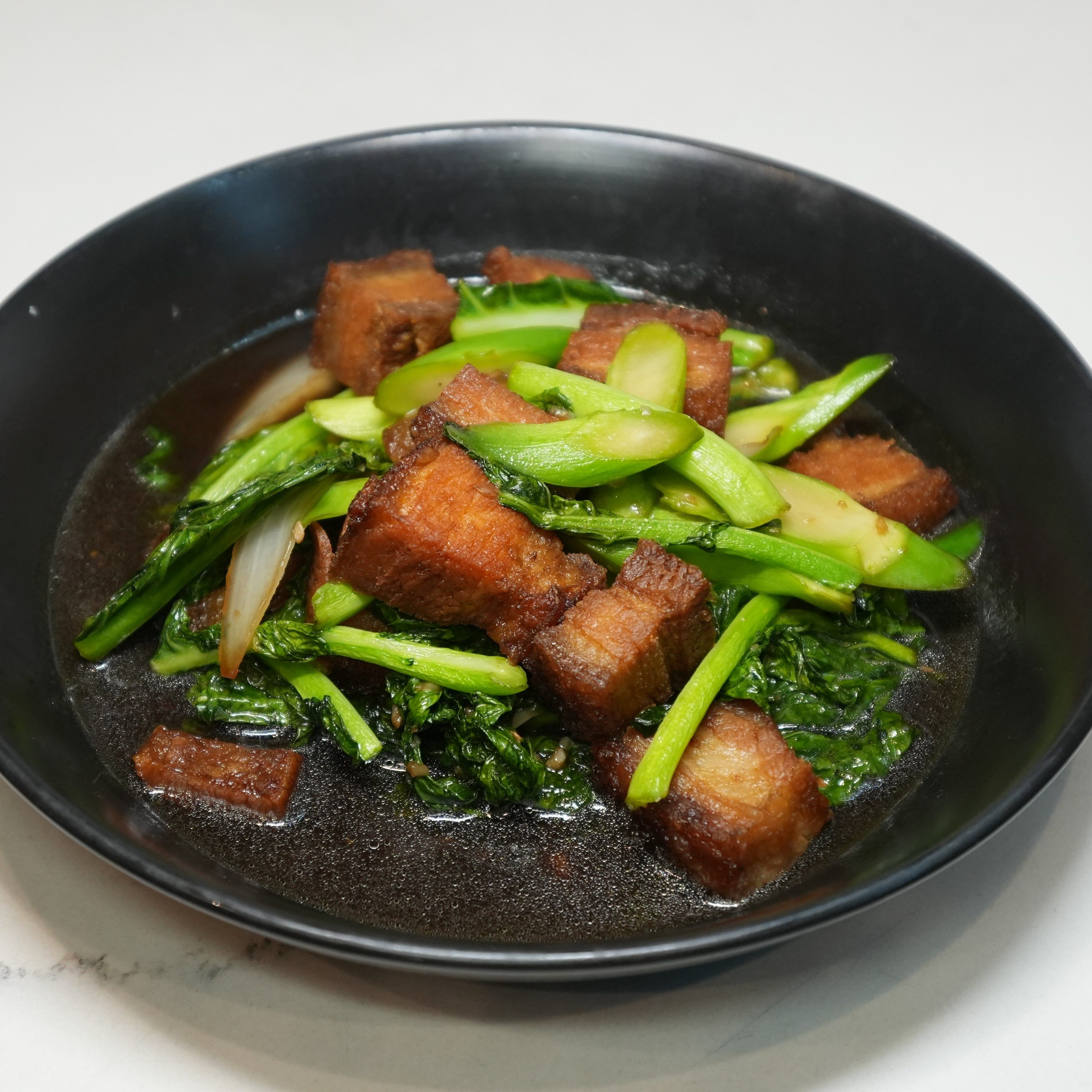 Crispy Porkbelly with Chinese Broccoli.