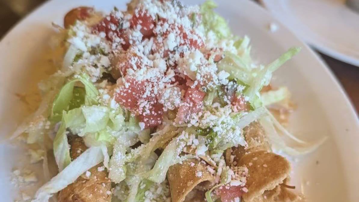 3 Rolled Tacos with Rice & Beans.