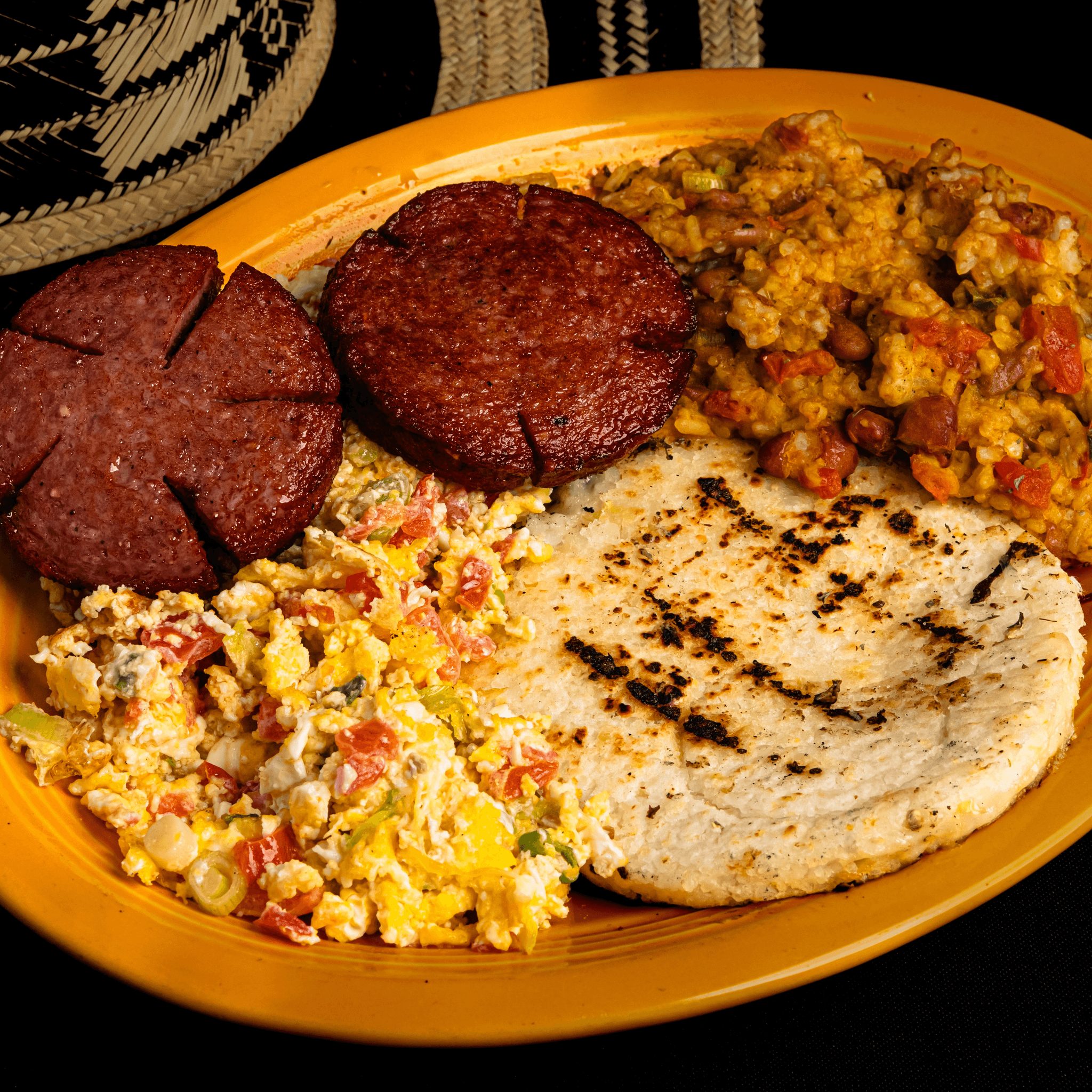 Calentado, Huevos, Salchichon Y Arepa.