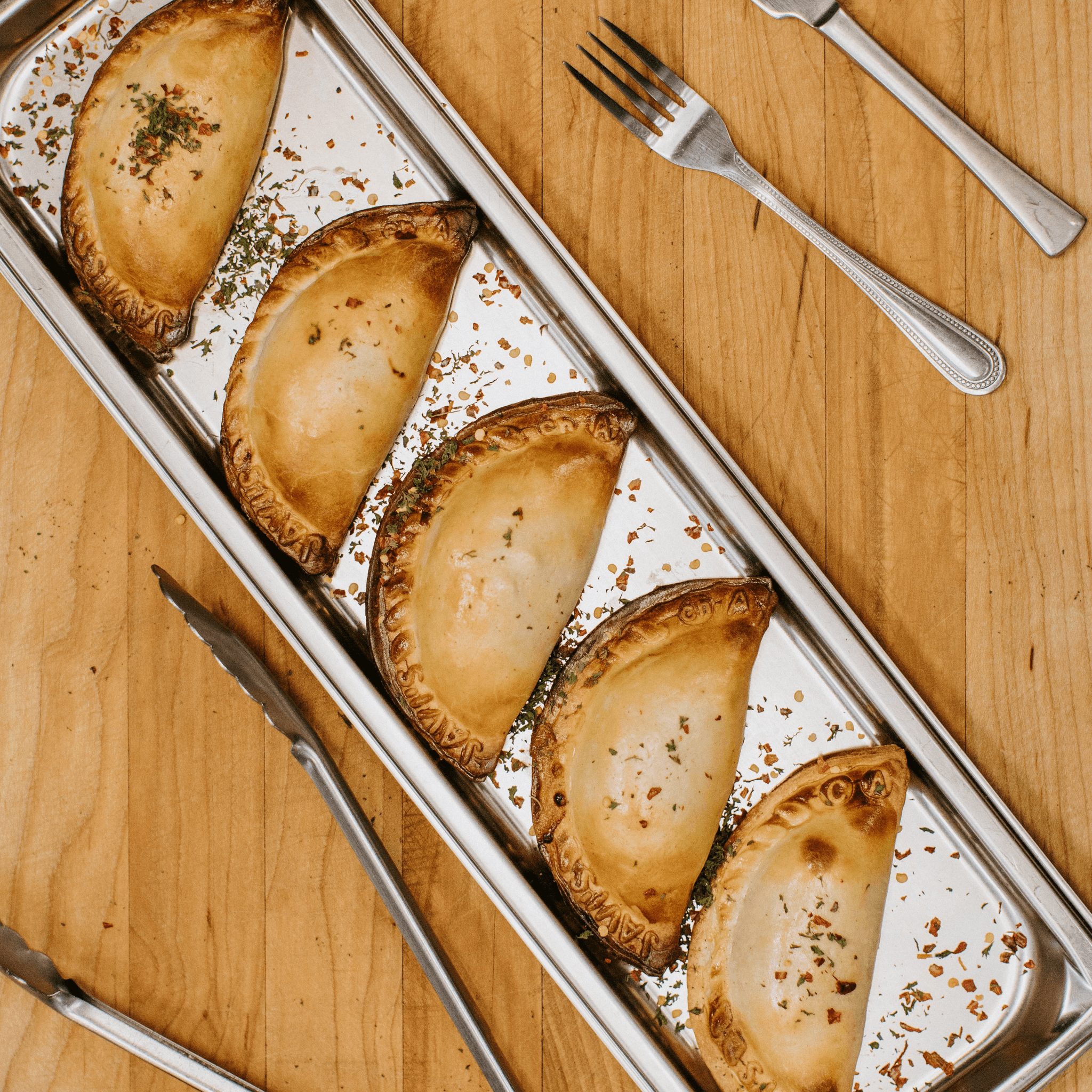 Dulce & Queso Crema (DQ) Empanada.