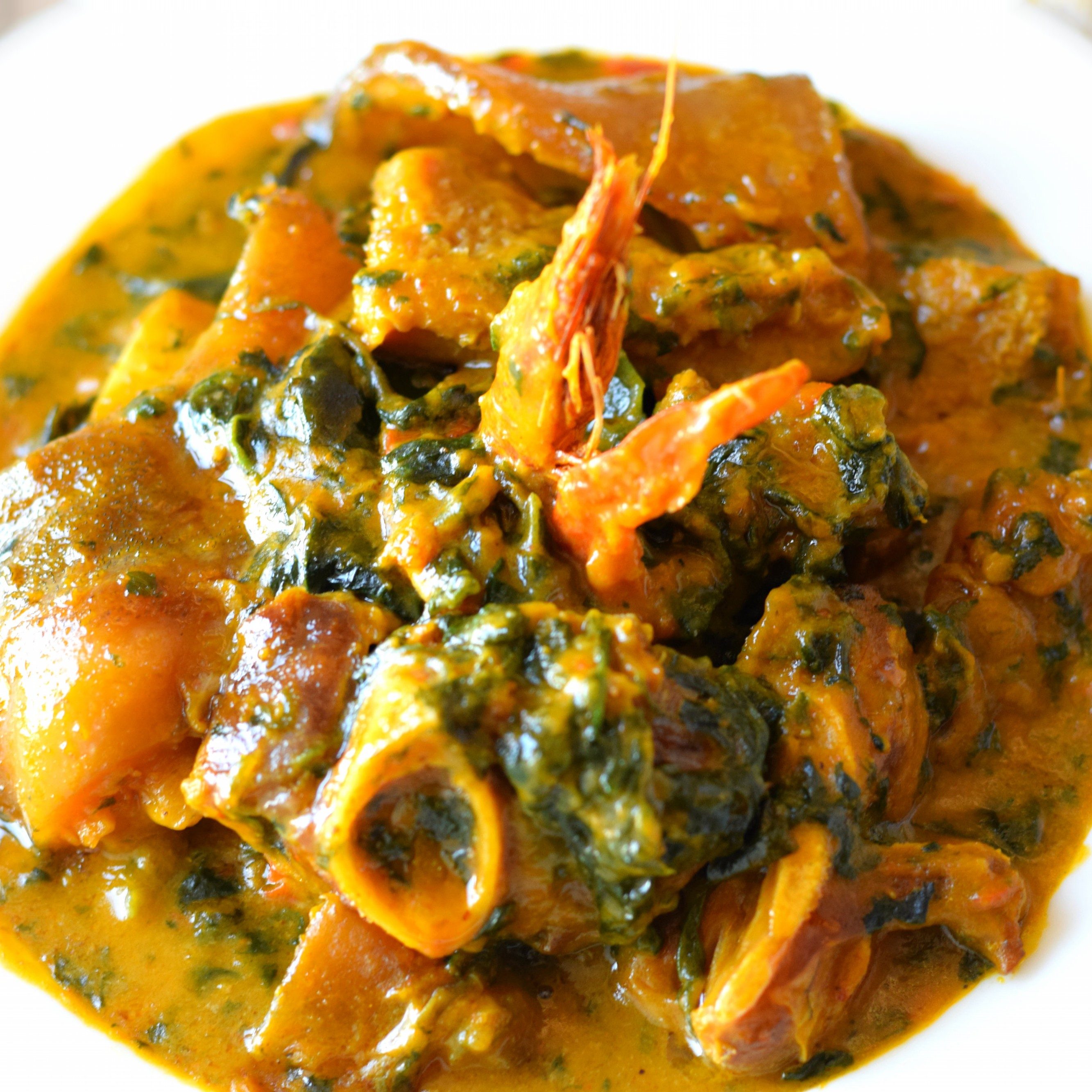 Bitter leaves soup w/ fufu and assorted meats..