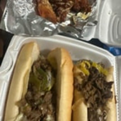 Large Philly Cheesesteak & 5 Wings.