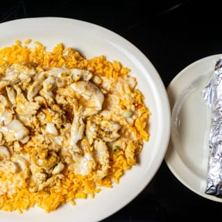 Arroz Con Pollo*