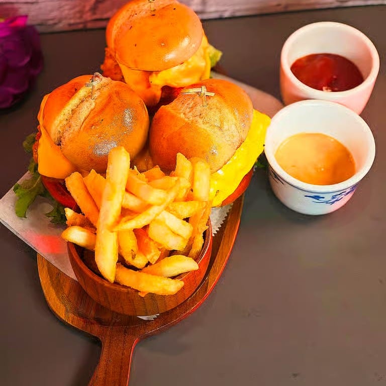 Dovis Best Burger Deluxe with Salad and French Fries.