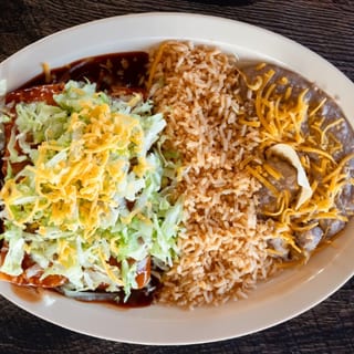 1 Enchilada Combination Plate with Soda & Side