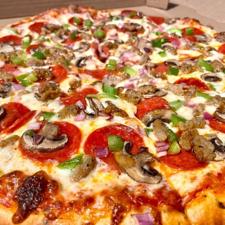 Delicious Greek Pizza and More!