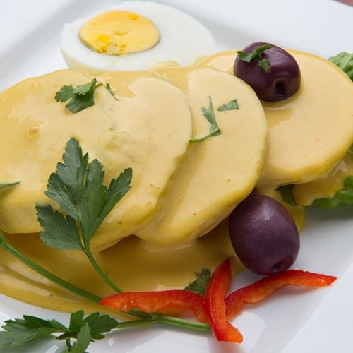 Papas O Yuca a La Huancaina.