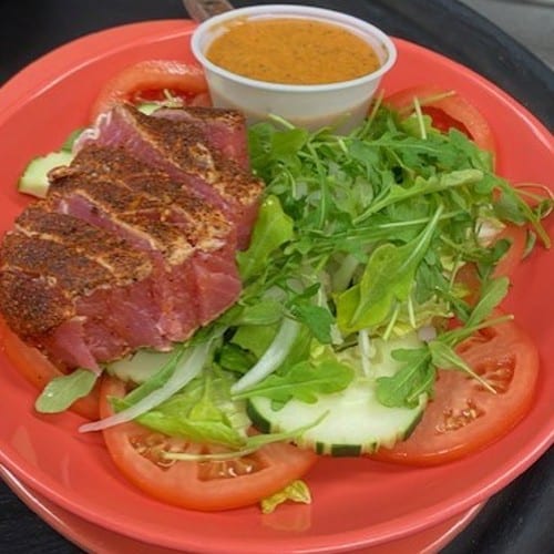 Seared AHI Tuna Steak over Garden Salad.