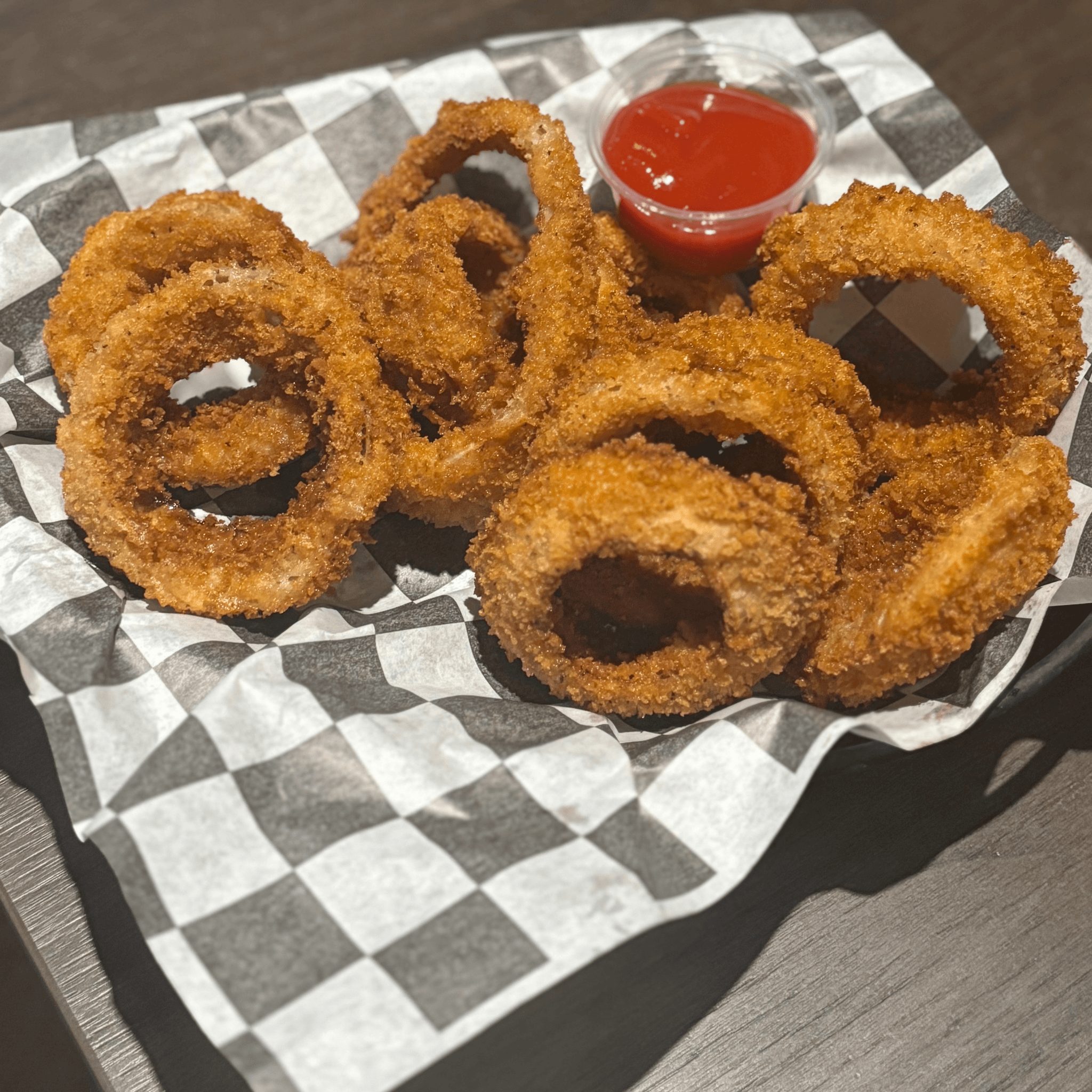 Hand Breaded Onion Rings.